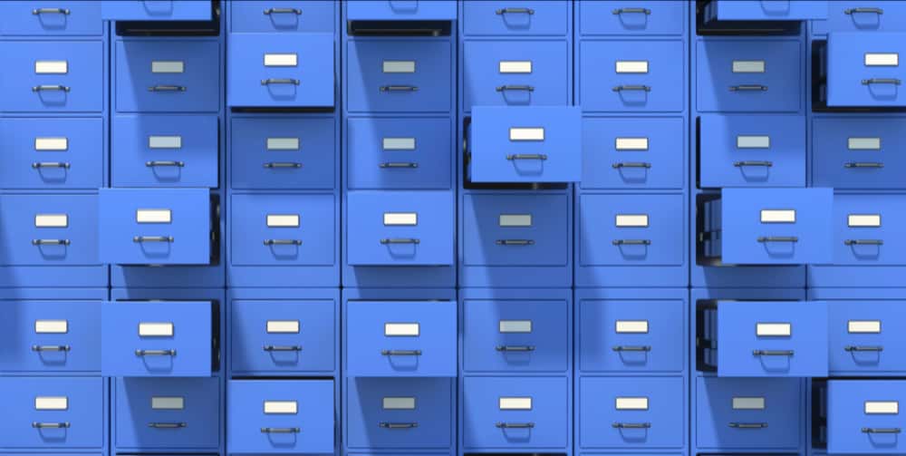 a multitude of blue filing cabinets neatly arranged 